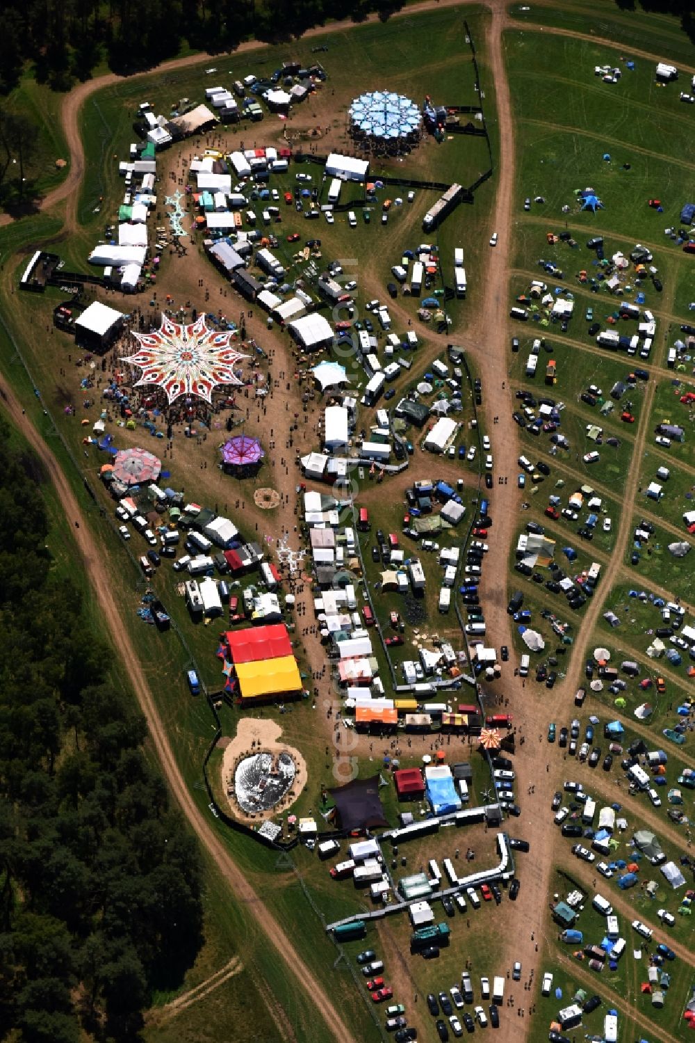 Aerial photograph Eldena - Participants in the Psychedelic Circus Festival - music festival on the event concert area in Eldena in the state Mecklenburg - Western Pomerania