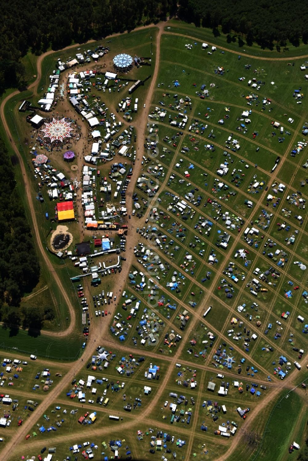 Eldena from the bird's eye view: Participants in the Psychedelic Circus Festival - music festival on the event concert area in Eldena in the state Mecklenburg - Western Pomerania