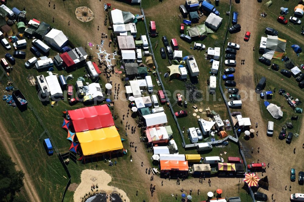 Eldena from the bird's eye view: Participants in the Psychedelic Circus Festival - music festival on the event concert area in Eldena in the state Mecklenburg - Western Pomerania