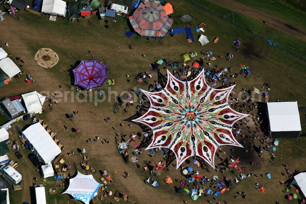 Eldena from above - Participants in the Psychedelic Circus Festival - music festival on the event concert area in Eldena in the state Mecklenburg - Western Pomerania