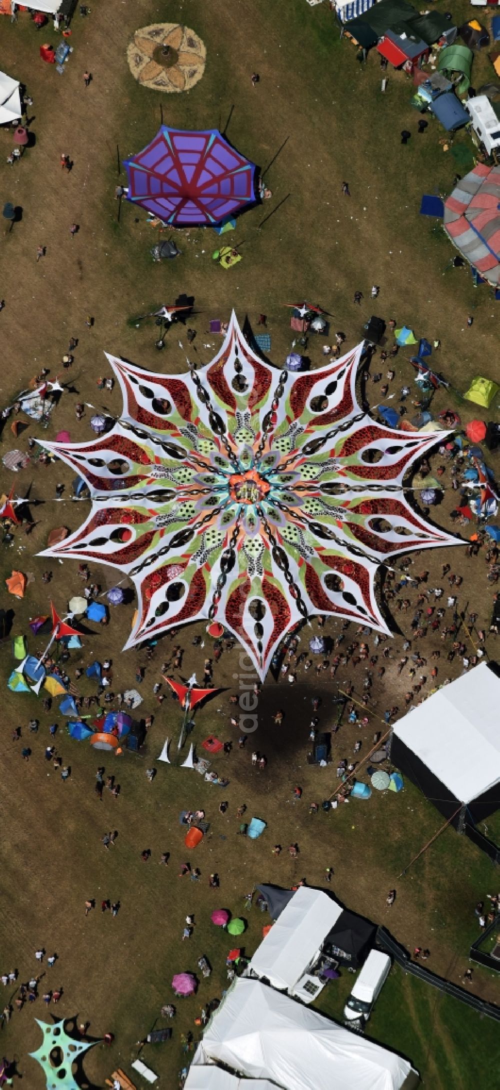 Eldena from above - Participants in the Psychedelic Circus Festival - music festival on the event concert area in Eldena in the state Mecklenburg - Western Pomerania