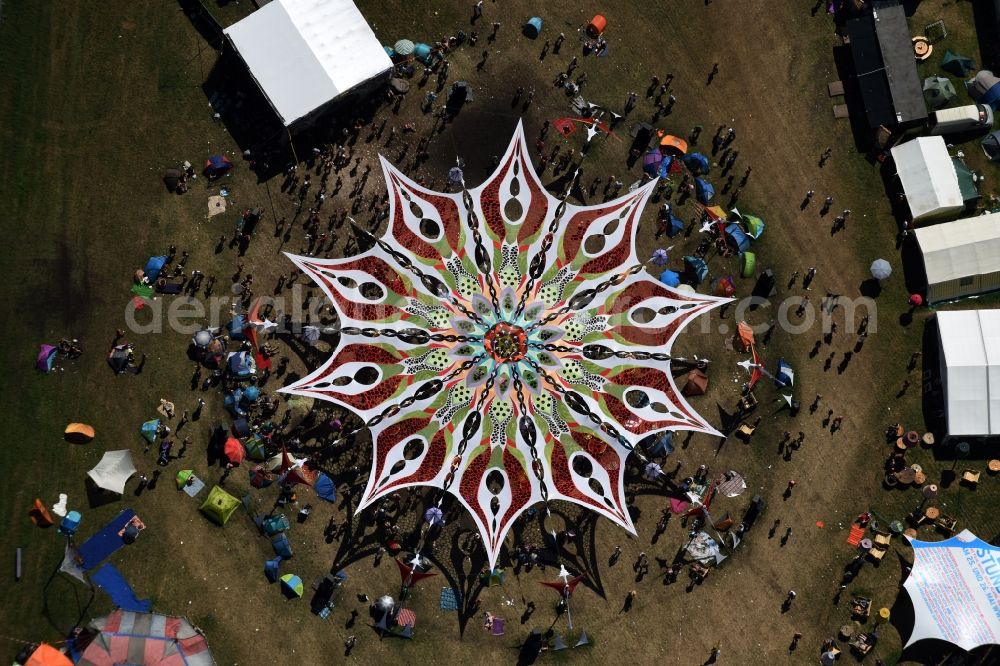 Eldena from above - Participants in the Psychedelic Circus Festival - music festival on the event concert area in Eldena in the state Mecklenburg - Western Pomerania