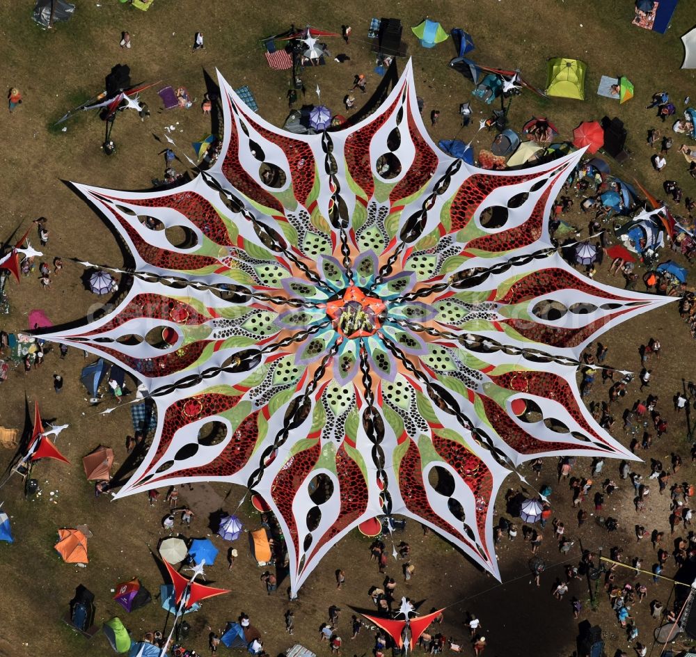 Eldena from the bird's eye view: Participants in the Psychedelic Circus Festival - music festival on the event concert area in Eldena in the state Mecklenburg - Western Pomerania