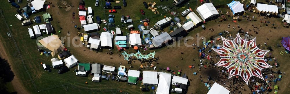 Eldena from above - Participants in the Psychedelic Circus Festival - music festival on the event concert area in Eldena in the state Mecklenburg - Western Pomerania