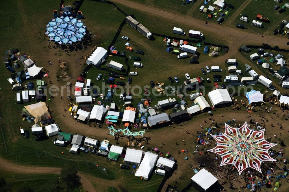 Eldena from the bird's eye view: Participants in the Psychedelic Circus Festival - music festival on the event concert area in Eldena in the state Mecklenburg - Western Pomerania