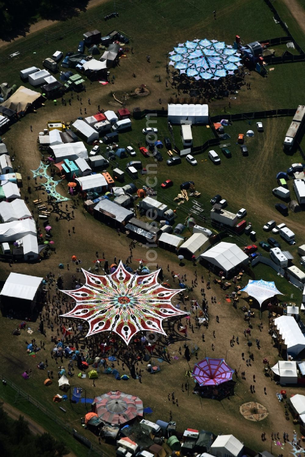 Eldena from above - Participants in the Psychedelic Circus Festival - music festival on the event concert area in Eldena in the state Mecklenburg - Western Pomerania