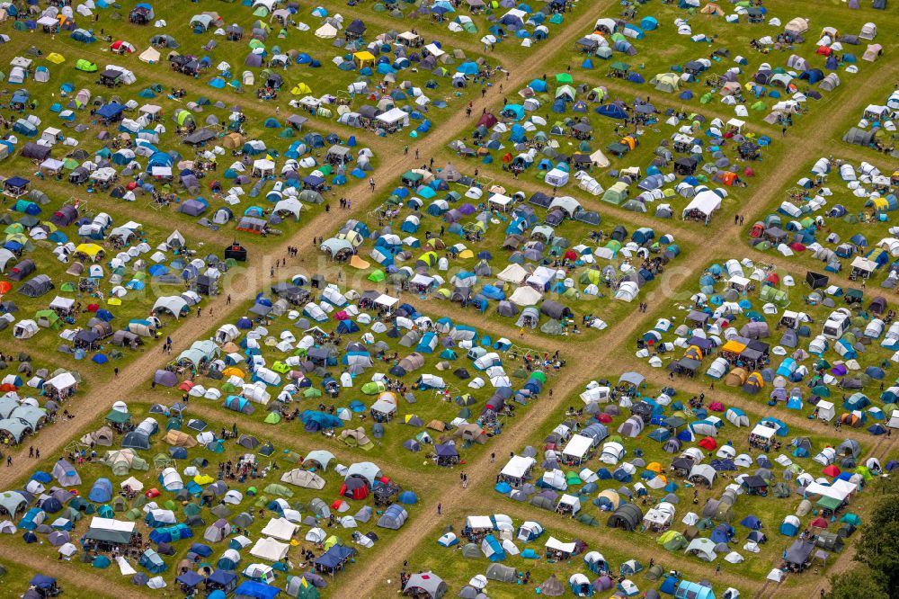 Hünxe from above - Participants of the Ruhrpott Rodeo Festival music festival on the event and concert grounds in Huenxe in the federal state of North Rhine-Westphalia, Germany