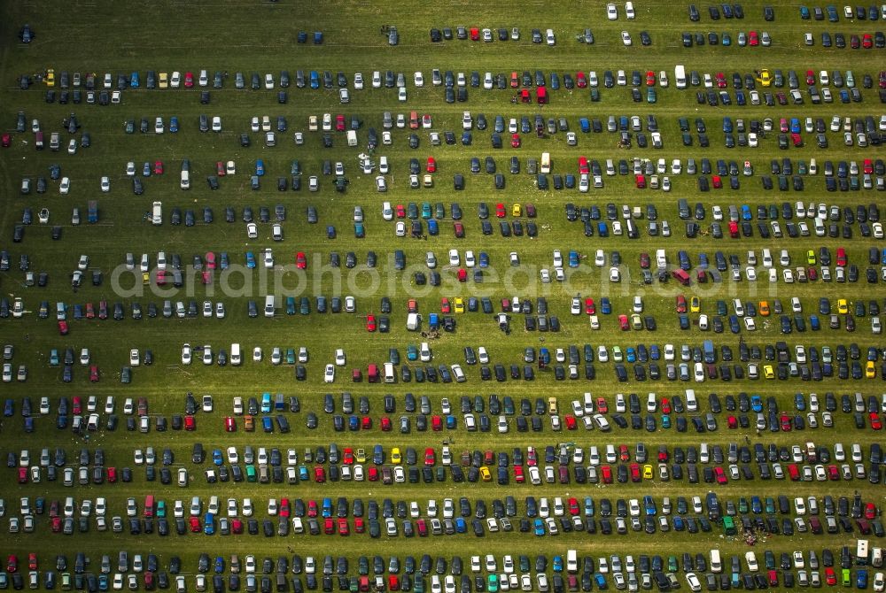 Hünxe from above - Participants in the Ruhrpott Rodeo Music Festival on the event concert grounds at Schwarze Heide airport in Huenxe in the state of North Rhine-Westphalia