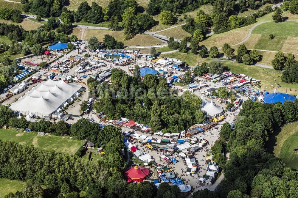 München from the bird's eye view: Participants in the Sommer Tollwood music festival on the event concert area in Munich in the state Bavaria, Germany