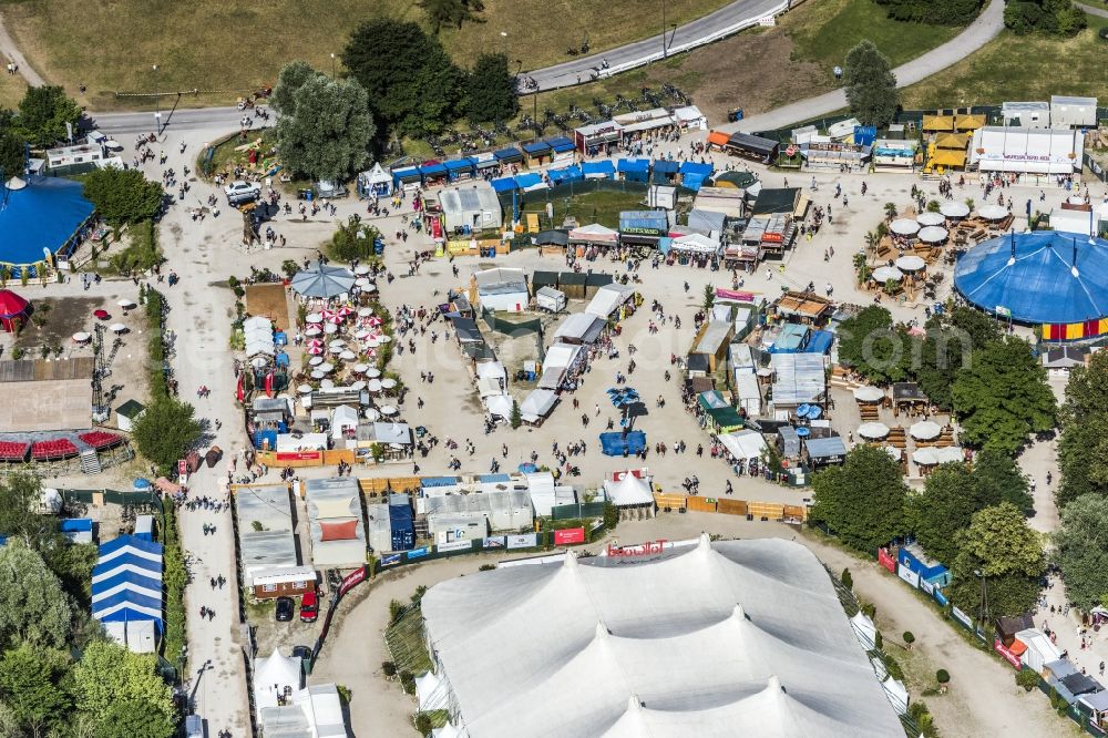 Aerial image München - Participants in the Sommer Tollwood music festival on the event concert area in Munich in the state Bavaria, Germany