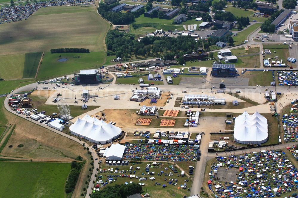 Neuhausen ob Eck from the bird's eye view: Participants in the Southside Music Festival with camping - tents and caravans on the event concert site of the airfield on street Take-Off Gewerbepark in Neuhausen ob Eck in the state Baden-Wuerttemberg, Germany