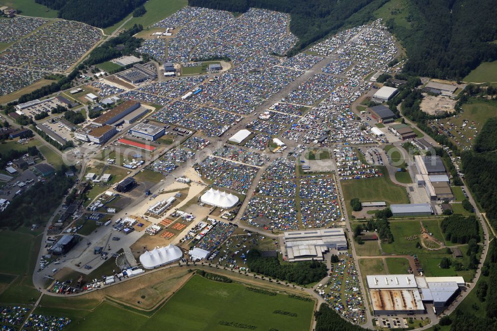 Neuhausen ob Eck from above - Participants in the Southside Music Festival with camping - tents and caravans on the event concert site of the airfield on street Take-Off Gewerbepark in Neuhausen ob Eck in the state Baden-Wuerttemberg, Germany