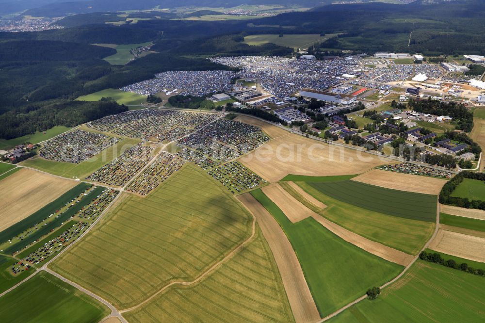 Aerial image Neuhausen ob Eck - Participants in the Southside Music Festival with camping - tents and caravans on the event concert site of the airfield on street Take-Off Gewerbepark in Neuhausen ob Eck in the state Baden-Wuerttemberg, Germany