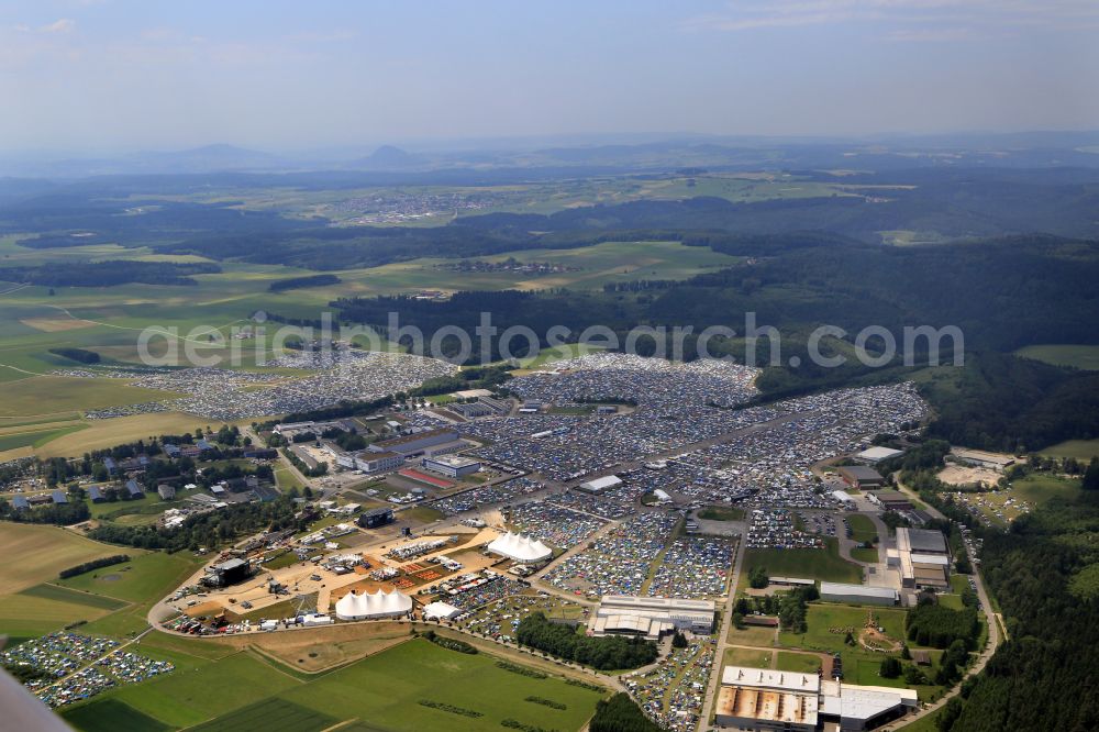 Aerial photograph Neuhausen ob Eck - Participants in the Southside Music Festival with camping - tents and caravans on the event concert site of the airfield on street Take-Off Gewerbepark in Neuhausen ob Eck in the state Baden-Wuerttemberg, Germany