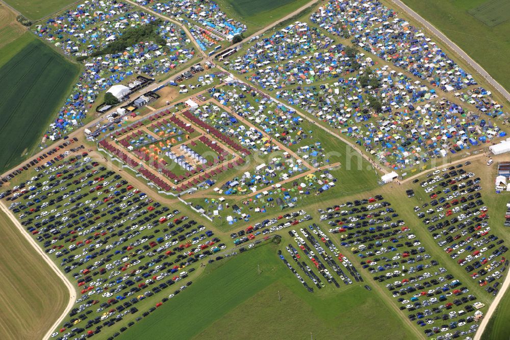 Aerial image Neuhausen ob Eck - Participants in the Southside Music Festival with camping - tents and caravans on the event concert site of the airfield on street Take-Off Gewerbepark in Neuhausen ob Eck in the state Baden-Wuerttemberg, Germany