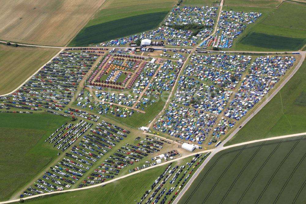 Aerial photograph Neuhausen ob Eck - Participants in the Southside Music Festival with camping - tents and caravans on the event concert site of the airfield on street Take-Off Gewerbepark in Neuhausen ob Eck in the state Baden-Wuerttemberg, Germany