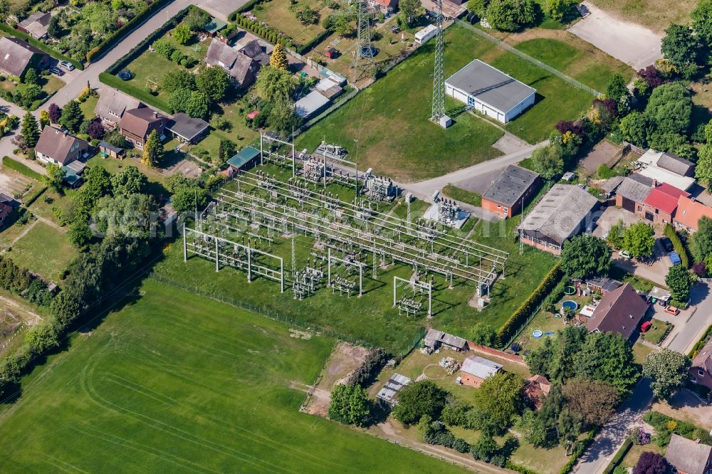 Göhl from above - Site of the substation for voltage conversion and electrical power supply on street Schleswagweg in Goehl in the state Schleswig-Holstein, Germany