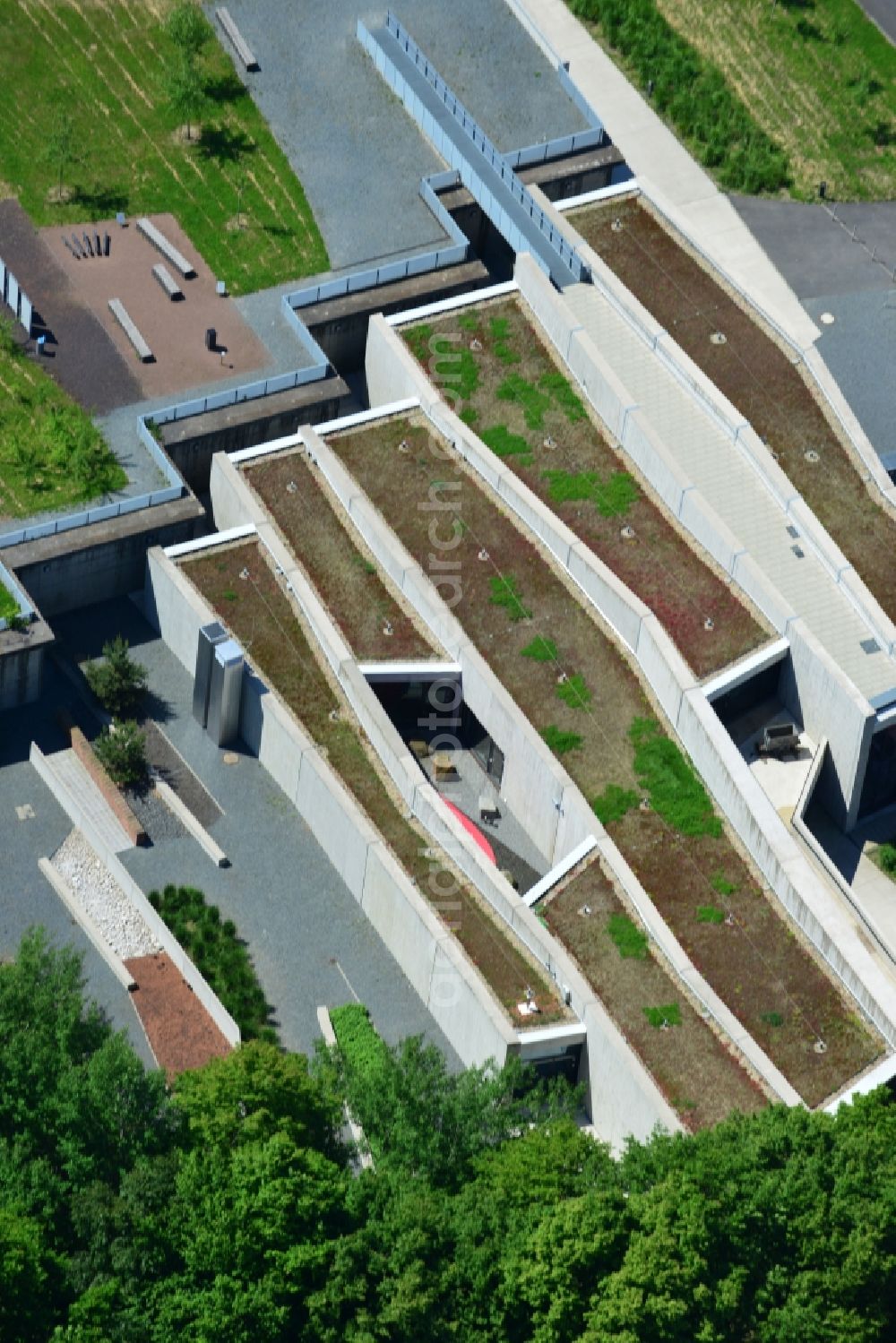 Aerial image Messel - Grounds of the UNESCO World Heritage Messel with the newly built visitor and information center designed by Landau + kindelbacher architects - interior designers in the state of Hesse