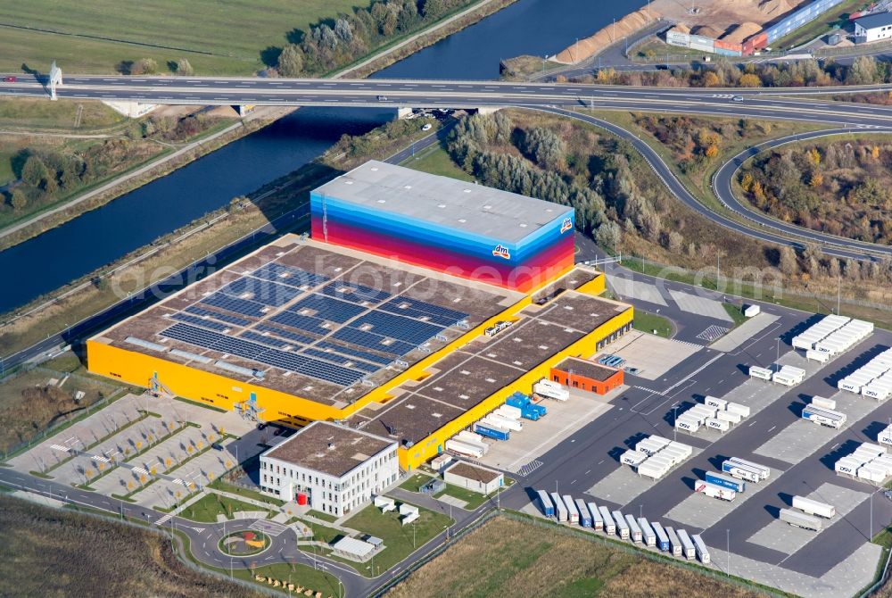 Wustermark from the bird's eye view: High-bay warehouse building complex and logistics center on the premises dm VZ Verteilerzentrum in Wustermark in the state Brandenburg, Germany