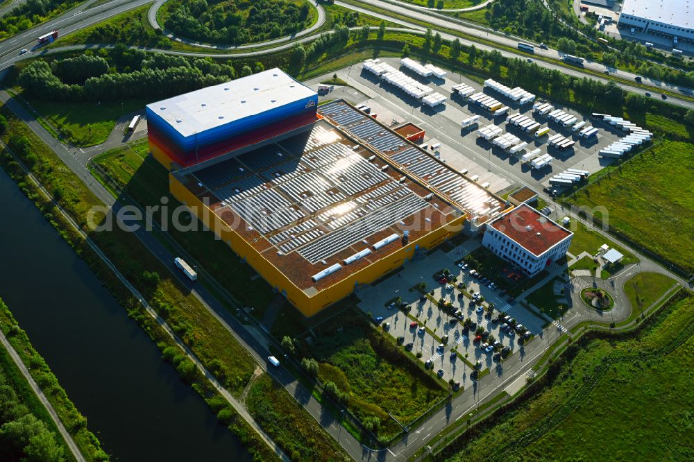 Aerial image Wustermark - High-bay warehouse building complex and logistics center on the premises dm VZ Verteilerzentrum in Wustermark in the state Brandenburg, Germany