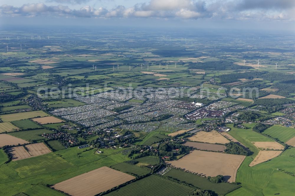 Aerial image Wacken - Participants in the Wacken music festival on the event concert area in Wacken in the state Schleswig-Holstein, Germany