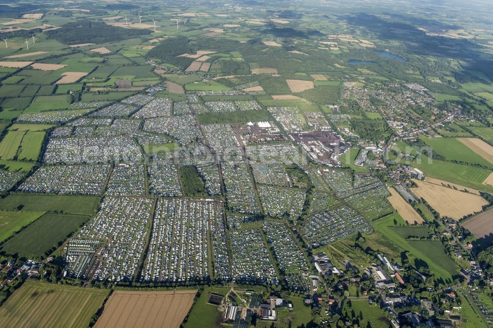 Wacken from the bird's eye view: Participants in the Wacken music festival on the event concert area in Wacken in the state Schleswig-Holstein, Germany