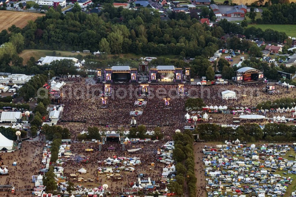 Aerial photograph Wacken - Participants in the Wacken music festival on the event concert area in Wacken in the state Schleswig-Holstein, Germany