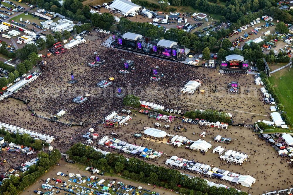 Wacken from the bird's eye view: Participants in the Wacken music festival on the event concert area in Wacken in the state Schleswig-Holstein, Germany