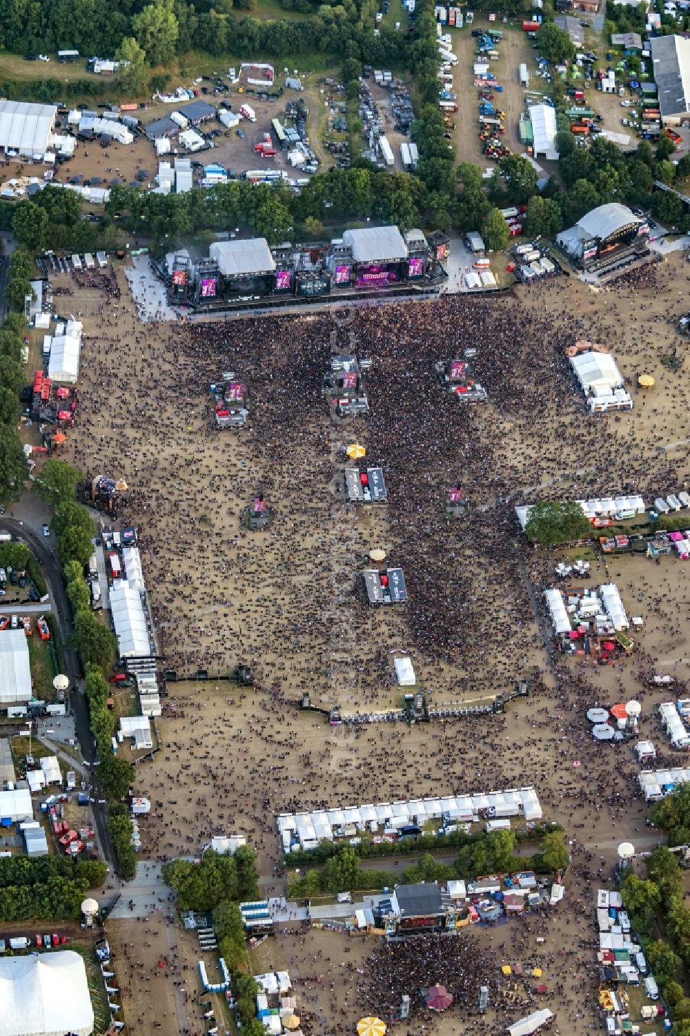 Aerial photograph Wacken - Participants in the Wacken music festival on the event concert area in Wacken in the state Schleswig-Holstein, Germany