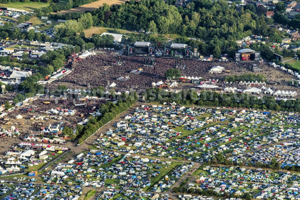 Wacken from the bird's eye view: Participants in the Wacken music festival on the event concert area in Wacken in the state Schleswig-Holstein, Germany