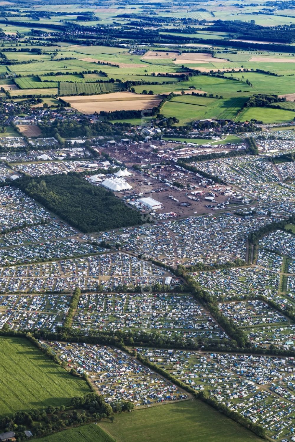 Wacken from above - Participants in the Wacken music festival on the event concert area in Wacken in the state Schleswig-Holstein, Germany