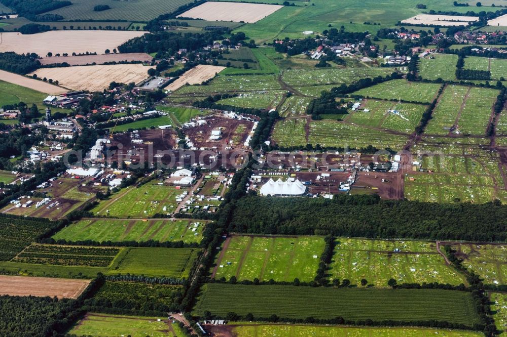 Wacken from the bird's eye view: Participants in the Waken Open Air music festival on the event concert area in Wacken in the state Schleswig-Holstein, Germany