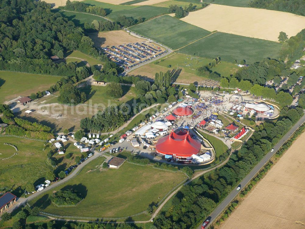 Aerial photograph Freiburg - Blick auf das Gelände des ZMF Zelt-Musik-Festival Freiburg zur Eröffnung im 25. Jahr seines Bestehens. Das Zelt-Musik-Festival ist eines der ältesten Zeltfestivals in Europa. Sein einmalige Mischung aus Zeltstadt, Natur und Kultur und ein hochkarätiges und vielfältiges Programm haben das Festival zu einem Begriff in der internationalen Festivallandschaft werden lassen. View of the site of the tent ZMF Freiburg Music Festival opening in the 25th Years of its existence. The tent-Music-Festival is one of the oldest tent festivals in Europe. His unique blend of tent city, nature and culture and a high caliber and diverse program have turned the festival into a household name in the international festival landscape.