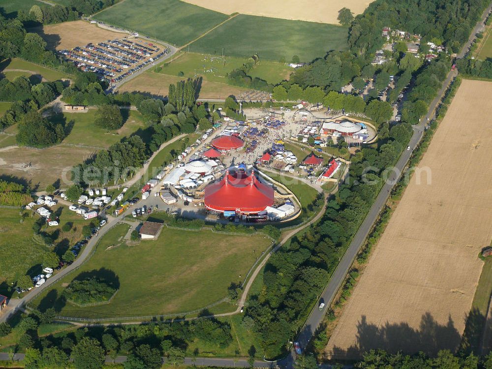 Freiburg from the bird's eye view: Blick auf das Gelände des ZMF Zelt-Musik-Festival Freiburg zur Eröffnung im 25. Jahr seines Bestehens. Das Zelt-Musik-Festival ist eines der ältesten Zeltfestivals in Europa. Sein einmalige Mischung aus Zeltstadt, Natur und Kultur und ein hochkarätiges und vielfältiges Programm haben das Festival zu einem Begriff in der internationalen Festivallandschaft werden lassen. View of the site of the tent ZMF Freiburg Music Festival opening in the 25th Years of its existence. The tent-Music-Festival is one of the oldest tent festivals in Europe. His unique blend of tent city, nature and culture and a high caliber and diverse program have turned the festival into a household name in the international festival landscape.