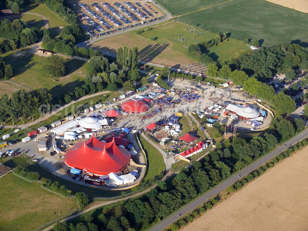 Aerial image Freiburg - Blick auf das Gelände des ZMF Zelt-Musik-Festival Freiburg zur Eröffnung im 25. Jahr seines Bestehens. Das Zelt-Musik-Festival ist eines der ältesten Zeltfestivals in Europa. Sein einmalige Mischung aus Zeltstadt, Natur und Kultur und ein hochkarätiges und vielfältiges Programm haben das Festival zu einem Begriff in der internationalen Festivallandschaft werden lassen. View of the site of the tent ZMF Freiburg Music Festival opening in the 25th Years of its existence. The tent-Music-Festival is one of the oldest tent festivals in Europe. His unique blend of tent city, nature and culture and a high caliber and diverse program have turned the festival into a household name in the international festival landscape.