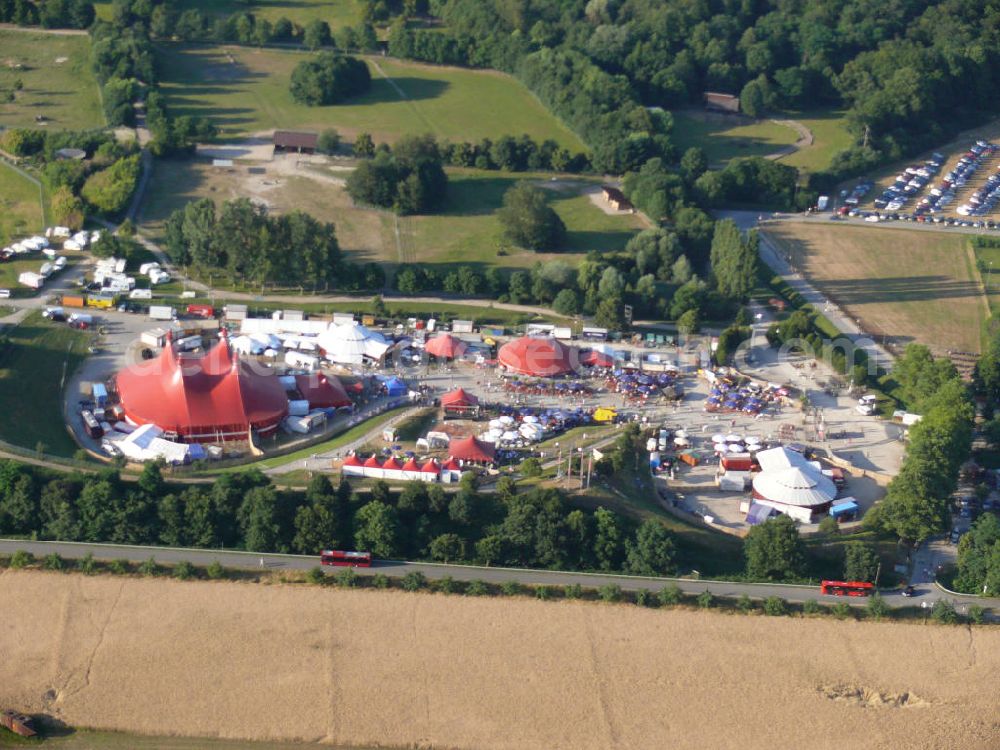 Freiburg from the bird's eye view: Blick auf das Gelände des ZMF Zelt-Musik-Festival Freiburg zur Eröffnung im 25. Jahr seines Bestehens. Das Zelt-Musik-Festival ist eines der ältesten Zeltfestivals in Europa. Sein einmalige Mischung aus Zeltstadt, Natur und Kultur und ein hochkarätiges und vielfältiges Programm haben das Festival zu einem Begriff in der internationalen Festivallandschaft werden lassen. View of the site of the tent ZMF Freiburg Music Festival opening in the 25th Years of its existence. The tent-Music-Festival is one of the oldest tent festivals in Europe. His unique blend of tent city, nature and culture and a high caliber and diverse program have turned the festival into a household name in the international festival landscape.