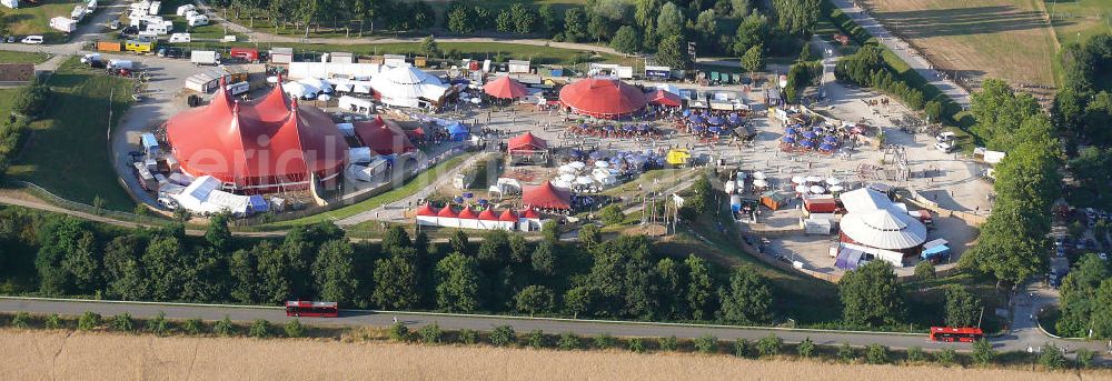 Freiburg from the bird's eye view: Blick auf das Gelände des ZMF Zelt-Musik-Festival Freiburg zur Eröffnung im 25. Jahr seines Bestehens. Das Zelt-Musik-Festival ist eines der ältesten Zeltfestivals in Europa. Sein einmalige Mischung aus Zeltstadt, Natur und Kultur und ein hochkarätiges und vielfältiges Programm haben das Festival zu einem Begriff in der internationalen Festivallandschaft werden lassen. View of the site of the tent ZMF Freiburg Music Festival opening in the 25th Years of its existence. The tent-Music-Festival is one of the oldest tent festivals in Europe. His unique blend of tent city, nature and culture and a high caliber and diverse program have turned the festival into a household name in the international festival landscape.