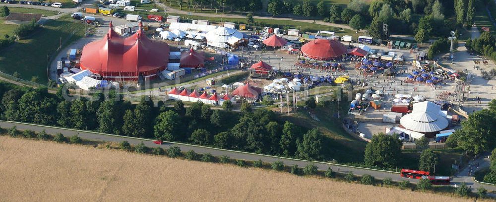 Aerial image Freiburg - Blick auf das Gelände des ZMF Zelt-Musik-Festival Freiburg zur Eröffnung im 25. Jahr seines Bestehens. Das Zelt-Musik-Festival ist eines der ältesten Zeltfestivals in Europa. Sein einmalige Mischung aus Zeltstadt, Natur und Kultur und ein hochkarätiges und vielfältiges Programm haben das Festival zu einem Begriff in der internationalen Festivallandschaft werden lassen. View of the site of the tent ZMF Freiburg Music Festival opening in the 25th Years of its existence. The tent-Music-Festival is one of the oldest tent festivals in Europe. His unique blend of tent city, nature and culture and a high caliber and diverse program have turned the festival into a household name in the international festival landscape.