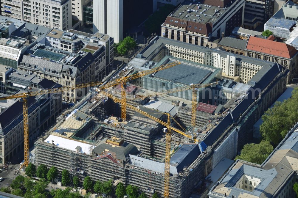 Berlin from above - View at the overhaul and modernization of the State Library of Berlin Unter den Linden in the district Mitte in Berlin. Currently in the first phase arises a new reading roomas a glass cube, a rare book reading room, a safe magazine for the special collections also incurred is the north old building which will be completely renovated. In the second phase then will arise a Freehand magazin, a treasury, a library museum, an exhibition area, a catering facility and the northern part of the old building will be completely renovated. The activities are carried out by the architect and museum designer HG Merz, builder is the covenant. The building is a protected monument