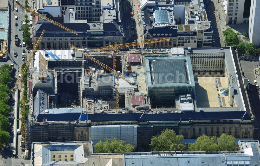 Berlin from above - View at the overhaul and modernization of the State Library of Berlin Unter den Linden in the district Mitte in Berlin. Currently in the first phase arises a new reading roomas a glass cube, a rare book reading room, a safe magazine for the special collections also incurred is the north old building which will be completely renovated. In the second phase then will arise a Freehand magazin, a treasury, a library museum, an exhibition area, a catering facility and the northern part of the old building will be completely renovated. The activities are carried out by the architect and museum designer HG Merz, builder is the covenant. The building is a protected monument