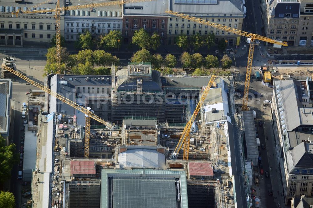 Aerial photograph Berlin - View at the overhaul and modernization of the State Library of Berlin Unter den Linden in the district Mitte in Berlin. Currently in the first phase arises a new reading roomas a glass cube, a rare book reading room, a safe magazine for the special collections also incurred is the north old building which will be completely renovated. In the second phase then will arise a Freehand magazin, a treasury, a library museum, an exhibition area, a catering facility and the northern part of the old building will be completely renovated. The activities are carried out by the architect and museum designer HG Merz, builder is the covenant. The building is a protected monument