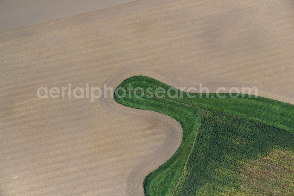 Aerial image Klein Kordshagen - Plowed field in Klein Kordshagen in the state Mecklenburg - Western Pomerania, Germany