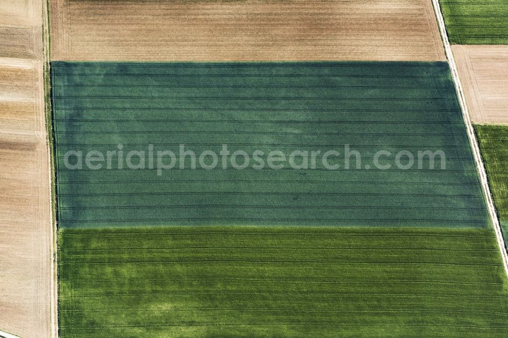 Rennertshofen from the bird's eye view: Plowed field and Wiese in Rennertshofen in the state Bavaria, Germany