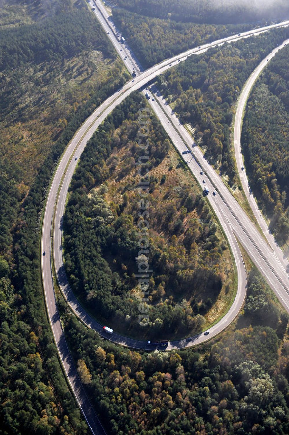 Aerial image Ziethen - Das Autobahndreieck Havelland in Brandenburg. Das Dreieck Havelland ist ein Autobahndreieck am nördlichem Berliner Ring (A 10) im Landkreis Havelland, das nach Westen die A 24 anbindet. Insgesamt 39,8 Millionen sollen in den Ausbau und Umbau des Autobahndreiecks Havelland fließen. Der Bund fördert den Ausbau im Rahmen des Masterplans für Güterverkehr und Logistik mit insgesamt 22,8 Millionen, weitere 17 Millionen Förderung kommen aus EFRE-Mitteln.