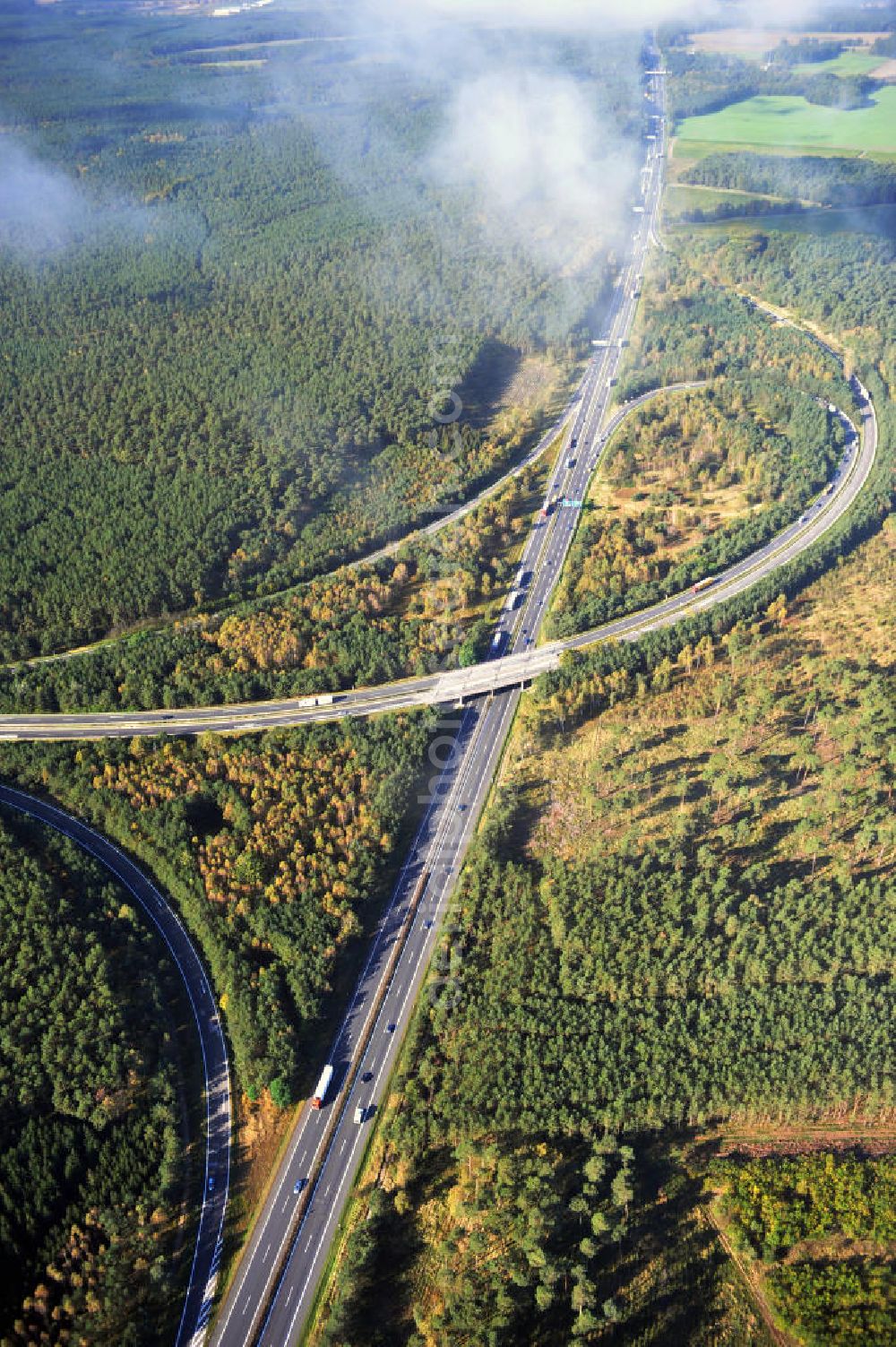 Aerial image Ziethen - Das Autobahndreieck Havelland in Brandenburg. Das Dreieck Havelland ist ein Autobahndreieck am nördlichem Berliner Ring (A 10) im Landkreis Havelland, das nach Westen die A 24 anbindet. Insgesamt 39,8 Millionen sollen in den Ausbau und Umbau des Autobahndreiecks Havelland fließen. Der Bund fördert den Ausbau im Rahmen des Masterplans für Güterverkehr und Logistik mit insgesamt 22,8 Millionen, weitere 17 Millionen Förderung kommen aus EFRE-Mitteln.