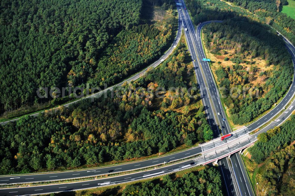 Aerial photograph Ziethen - Das Autobahndreieck Havelland in Brandenburg. Das Dreieck Havelland ist ein Autobahndreieck am nördlichem Berliner Ring (A 10) im Landkreis Havelland, das nach Westen die A 24 anbindet. Insgesamt 39,8 Millionen sollen in den Ausbau und Umbau des Autobahndreiecks Havelland fließen. Der Bund fördert den Ausbau im Rahmen des Masterplans für Güterverkehr und Logistik mit insgesamt 22,8 Millionen, weitere 17 Millionen Förderung kommen aus EFRE-Mitteln.