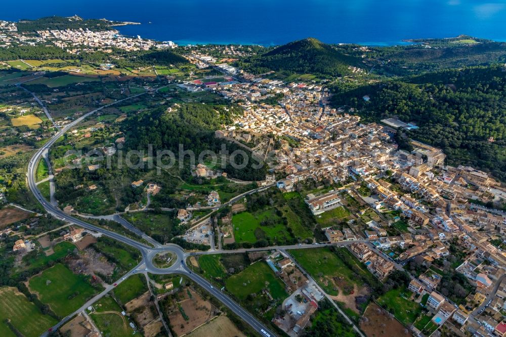 Aerial image Capdepera - City area with outside districts and inner city area in Capdepera in Balearische Insel Mallorca, Spain