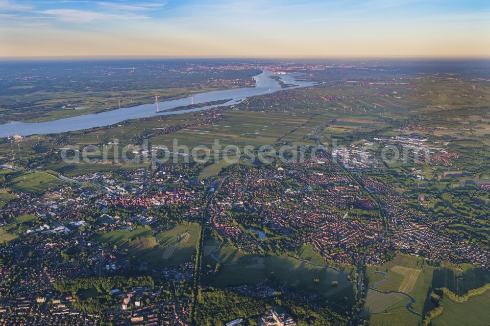 Aerial image Stade - General overview and urban area with outskirts and inner city area in Stade and Hamburg on the Elbe in the background in the state Lower Saxony, Germany