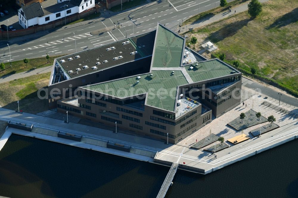 Aerial image Rostock - Construction site to build a new office and commercial building of Centogene AG Am Strande on Holzhalbinsel in Rostock in the state Mecklenburg - Western Pomerania, Germany