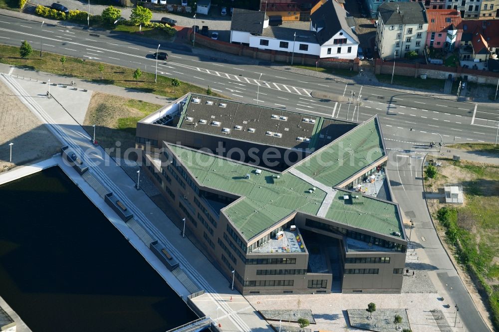 Aerial photograph Rostock - Construction site to build a new office and commercial building of Centogene AG Am Strande on Holzhalbinsel in Rostock in the state Mecklenburg - Western Pomerania, Germany